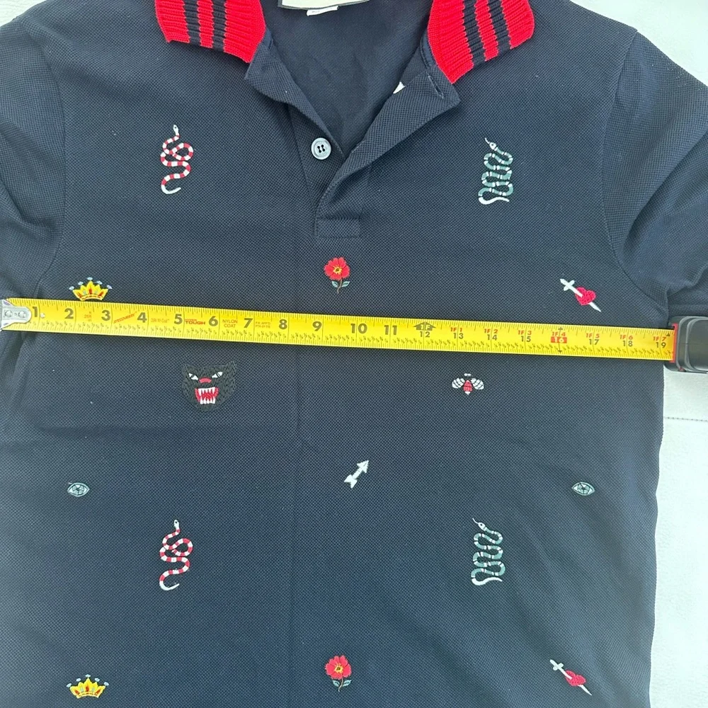 Gucci Black Polo with Red Striped Collar and Multicolor Embroidered Motifs